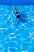'Woman In Swimming Pool; Edmonton, Alberta, Canada'