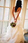 Bride Looking Out The Window