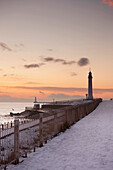 'Sunderland, Tyne And Wear, England; A Lighthouse Along The Coast In Winter'