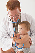 A Pediatrician Examining A Baby