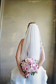 'A Bride Holding Her Floral Bouquet; St. Catherine's, Ontario, Canada'