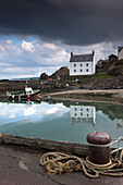 'Houses Along The Water And A Boat On The Shore; St. Abb's Head, Scottish Borders, Scotland'