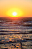 'Sunset Along The Oregon Coast; Oregon, United States Of America'
