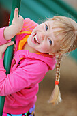 'A Girl Playing On Playground Equipment; Troutdale, Oregon, United States Of America'