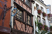 'Detail Of Medieval Timber Style Buildings Decoratively Painted With Flower Boxes; Strasbourg, France'