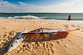 'A Man On The Beach With His Windsurfing Board; Tarifa, Cadiz, Andalusia, Spain'