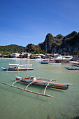 'Bangka Boats Sit In The Picturesque And Scenic Bay; El Nido, Bacuit Archipelago, Palawan, Philippines'