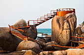 'Wooden Boardwalk And Lookout On The Rocks Along The Ocean; Koh Tao Thailand'