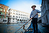 'A Gondolier Rowing A Gondola; Venice, Venezia, Italy'