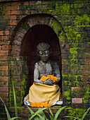 'Ubud, Bali, Indonesia; Stone Buddha Statue'