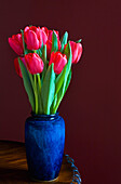 Tulips In Blue Vase