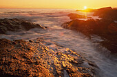 Setting Sun Over Tide-Washed Rocks, Pacific Rim National Park, Vancouver Island, British Columbia, Canada