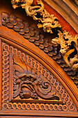 'Details Of A Wooden Door On The Old Town Hall In Stare Mesto; Prague, Hlavni Mesto Praha, Czech Republic'