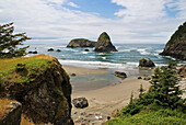 'Rock formations in the water and beach along the oregon coast;Oregon united states of america'