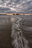 'Opposing waves strike each other on chesterman beach;Tofino, british columbia, canada'