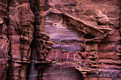 'A rugged rock wall of colourful sandstone;Petra jordan'