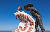 'Xiutla folkloric ballet sculpture on the malecon;Puerto vallarta mexico'