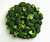 Agriculture - Broccoli florets, large, on white.