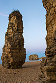 'Rock columns at the water's edge along the coast; South Shields, Tyne and Wear, England'