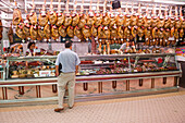 Butcher stand with hams in market hall, Valencia, Valencia, Spain