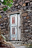 Wooden door to a stone house, Praia, Santiago, Cape Verde