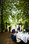 Waiter at restaurant terrace, Villa Sorgenfrei, country hotel, Augustusweg 48, Radebeul, Dresden, Germany