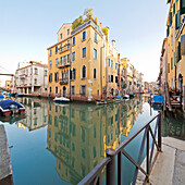 Reflection of buildings in a canal near Campo dei Santo Apostoli, Venice, Veneto, Italy, Europe