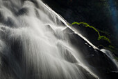 Waterfall illuminated by sunlight, Soana Valley, Piedmont, Gran Paradiso National Park