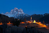 Selva di Cadore and his Church, late in the evening, with a view of Mount Pelmo in springtime, Dolomites.