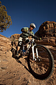 Kyle Mears mountain biking on the Porcupine Rim trail, Moab, Utah.