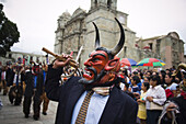 Men in devil masks parade through the Zocalo and past the cathedral during the Guelaguetza celebrations in Oaxaca City, Oaxaca, Mexico on July 19, 2008. The Guelaguetza is an annual folk dance festival in Oaxaca - dancers from different regions of the sta