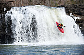 Team Jackson Kayaks member Nick Troutman runs falls on the Caney Fork in Rock Island, TN.