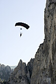 A base jumper opens up their chute after a jump near Spanish Fork in Utah.