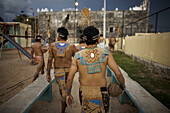 Mayan ball players enter a court before a game in Chapab village in Yucatan state in Mexico's Yucatan peninsula, Mexico, June 13, 2009.