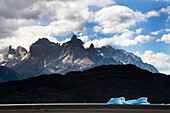 TORRES DEL PAINE NATIONAL PARK, PATAGONIA, CHILE. The Cuernos del Paine protrude into the clouds.