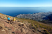 Katrin Schneider and Susann Scheller on a hike to the top of Lion's Head above the city of Cape Town. South Africa.