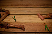 Mentawai Medicine men, covered in tattoos, perform ceremonies for visitors on Kandui Island, including dancing, chanting and smoking.