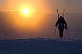 Naheed Henderson Hiking with skis up Mount Glory at sunrise on Teton Pass in Jackson, Wyoming.   Jimmy Chin / Aurora Photos 