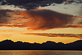 A sunset over the Sea of Cortez and the Sierra de Giganta on the Baja California mainland seen from a beach on Isla del Carmen. Baja California, Mexico.   Lars Schneider / Aurora Photos 