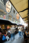Melbourne's Flinders Lane, home to a number of espresso joints and cafes is as popular with tourists as with locals.  Near the CBD. Melbourne, Australia.