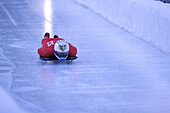 Skeleton racer flying down the bobsled track in Salt Lake City, Utah.