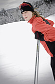 A female cross-country skier, Kristin Dewey, during a morning of skiing on snowy winter day in Hanover, New Hampshire.