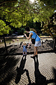 Anna Alcorn and her son Felix check out the flamingos at the San Diego Zoo in San Diego, California.