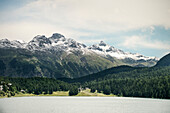 Snow-capped mountains of the Alps at lake St. Moritz, St. Moritz, Engadin, Grisons, Switzerland