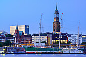 River Elbe with old sailing ship and church  of St. Michaelis, Michel, in the background, Hamburg, Germany