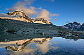 La Tresenta and Ciarforon reflecting in mountain lake, Rifugio Vittorio Emanuele II, Gran Paradiso, Gran Paradiso Nationalpark, Graian Alps range, valley of Aosta, Aosta, Italy