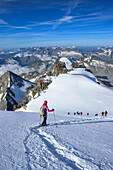 Several persons roped descending on glacier from Gran Paradiso, Gran Paradiso, Gran Paradiso Nationalpark, Graian Alps range, valley of Aosta, Aosta, Italy