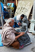 Making clay statues of a Hindu goddess, Kumartulli district, Kolkata (Calcutta), West Bengal, India, Asia