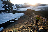 Woman hiking near Mount Olympus and Blue Glacier, Olympic National Park, UNESCO World Heritage Site, Washington State, United States of America, North America