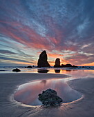 Sea stacks at sunset, Cannon Beach, Oregon, United States of America, North America